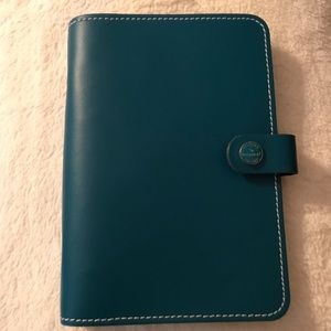 Aqua personal sized Filofax rings planner